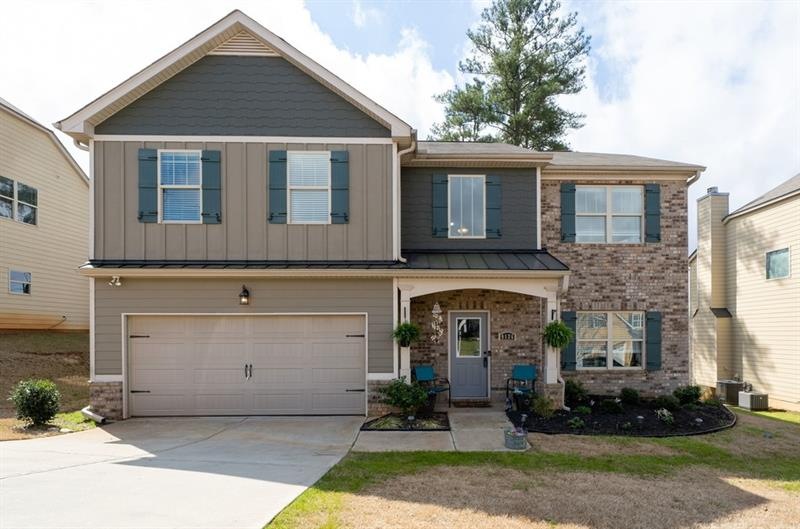 This beautiful 4 bedroom home is in Mirror Lake ~ Villa Rica.