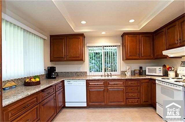 Newer custom cabinets and granite counters