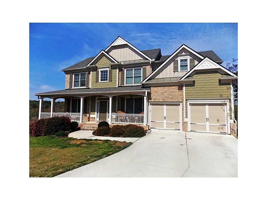 Exterior Front. 2 Sty Brick & Concrete siding with