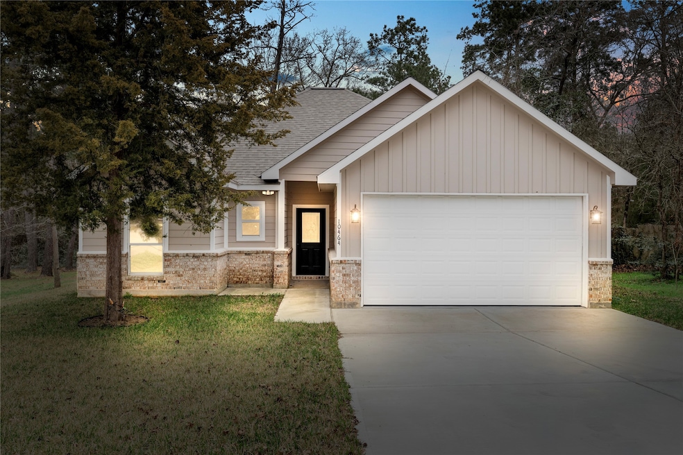 This charming, single-story home features a modern