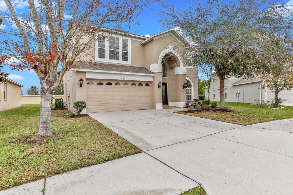 9755 Simeon Dr, Land O Lakes, FL 34638 - photo 1