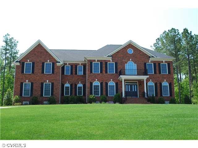 Exterior Front - Stunning 4-sided brick custom hom