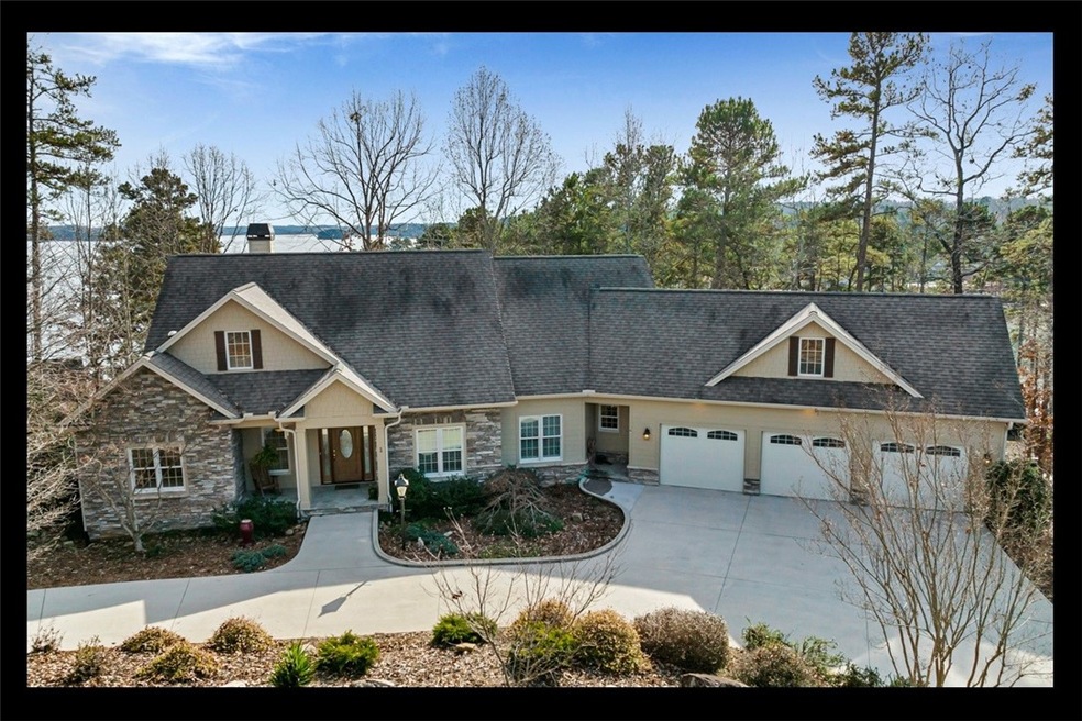 Beautiful setting with three car garage and level