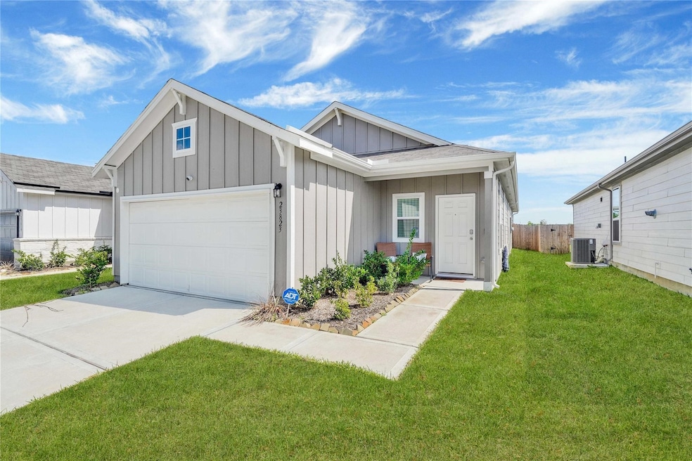 a charming single-family home with a brick and sto