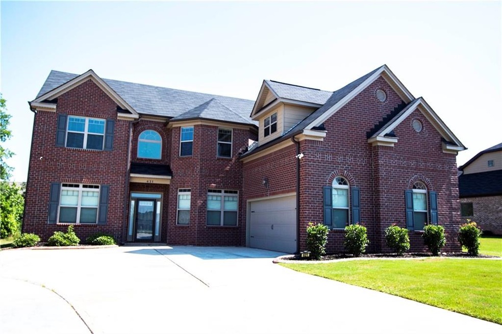 exterior front. side entrance garage and extra lar
