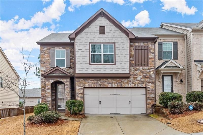 Welcome home to this beautiful end unit!