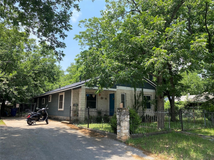 View of front of property featuring a fenced fron