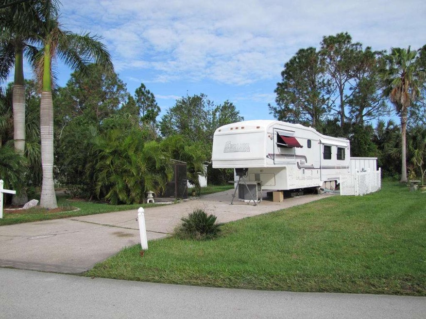 165 Plantation Dr, Titusville, FL 32780 - photo 1