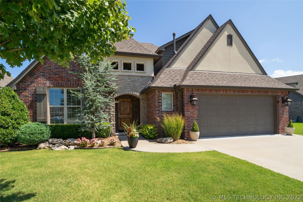 Beautiful curb appeal on lake view lot with desira