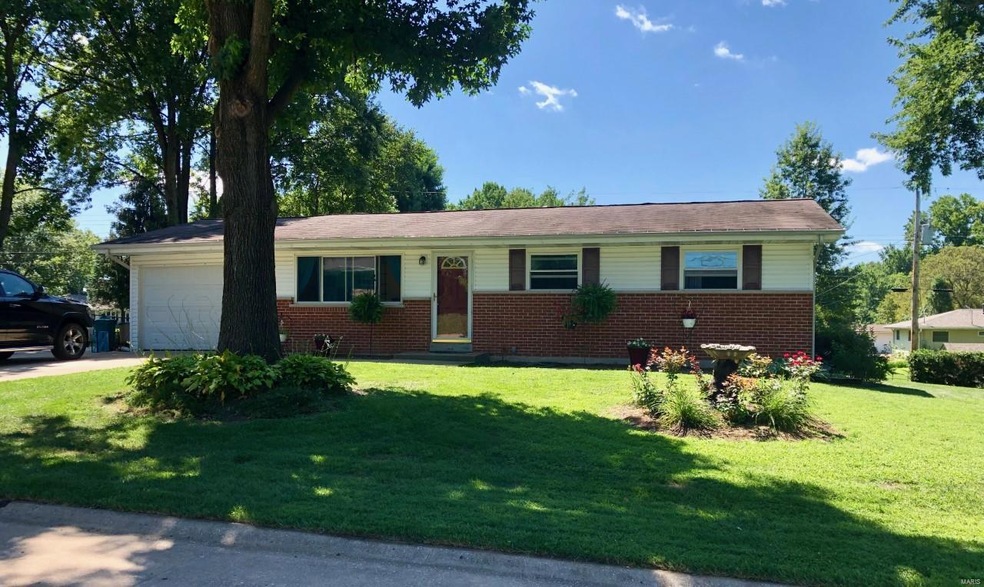 Cute home on a quiet street with mature shade tree