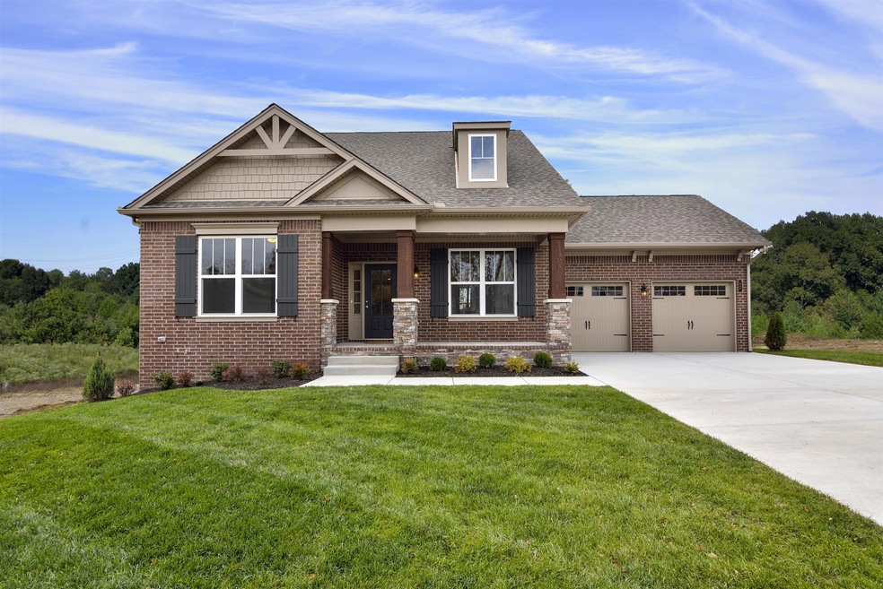 Your new home has a completely charming exterior.  Welcome friends & family on your rocking chair front porch!