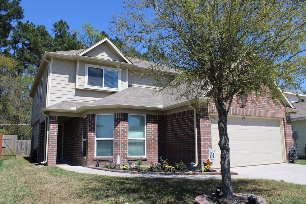 9953 Kingfisher Dr, Conroe, TX 77385 - photo 1