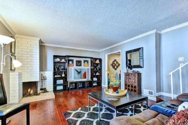 Lovely living room with cozy fireplace and beautif