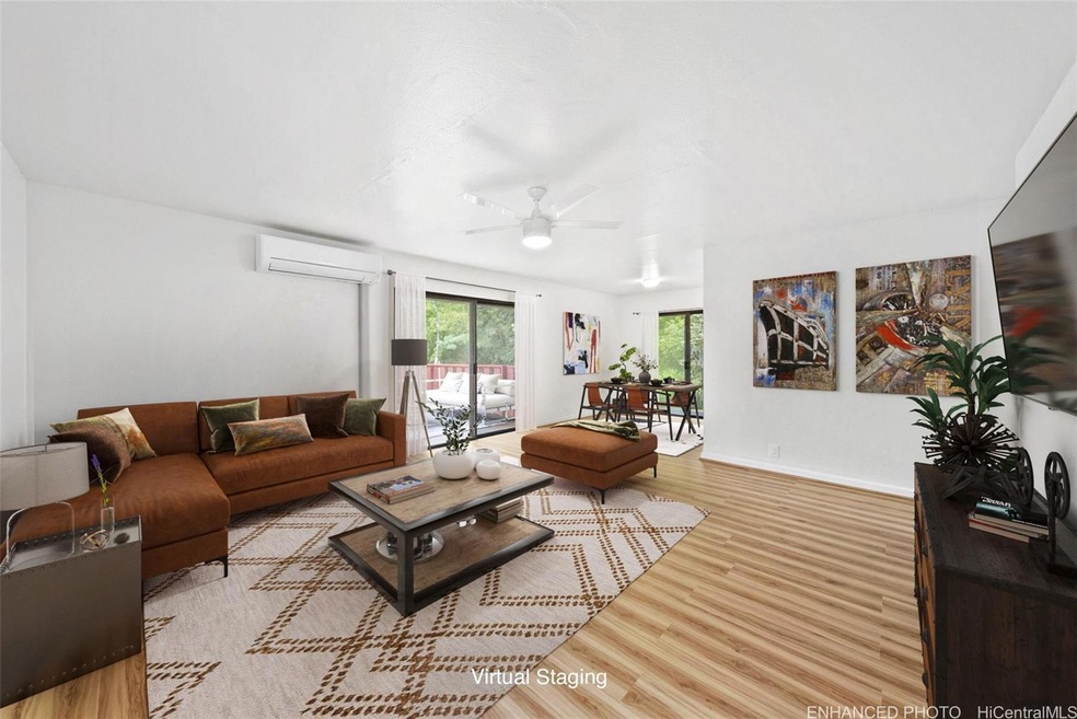 Living room and dining area.  Virtually staged and
