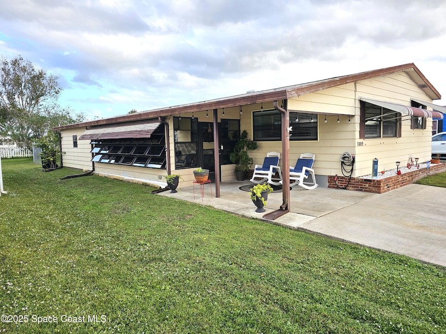 1809 Mango St NE, Palm Bay, FL 32905 - photo 1