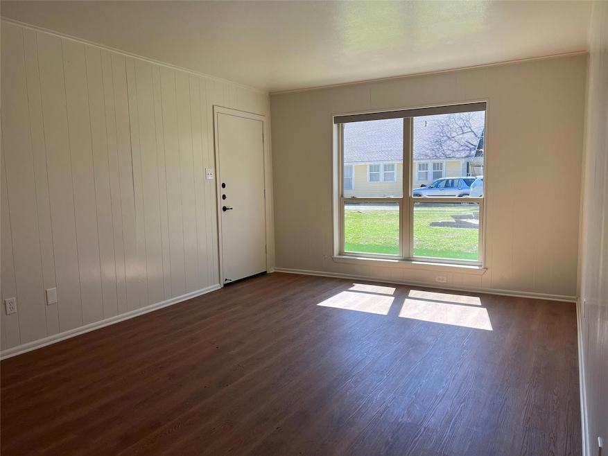 This is a bright and airy living room, featuring a