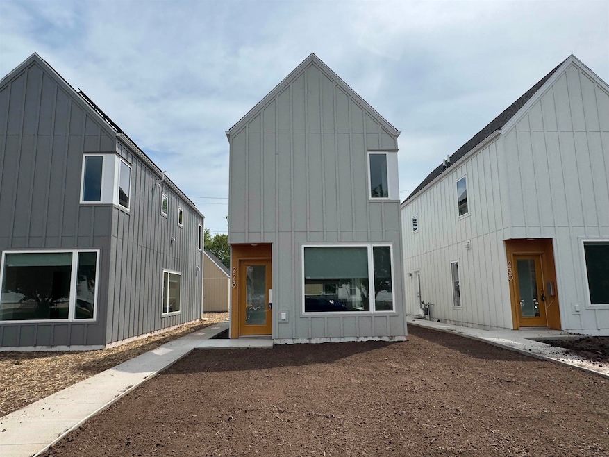 Rear view of house with board and batten siding