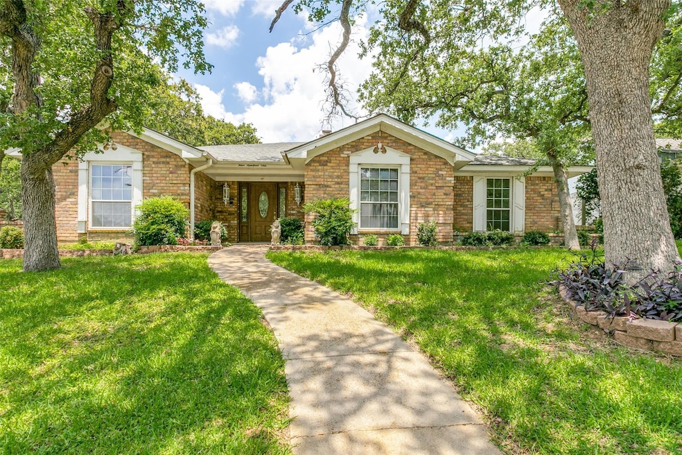 401 Chisholm Trail, Hurst, TX 76054 - photo 1