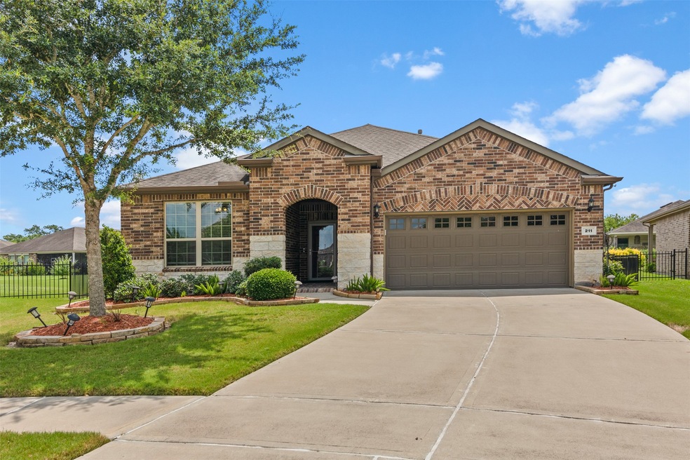 211 Cattleman Cove, Richmond, TX 77469 - photo 1