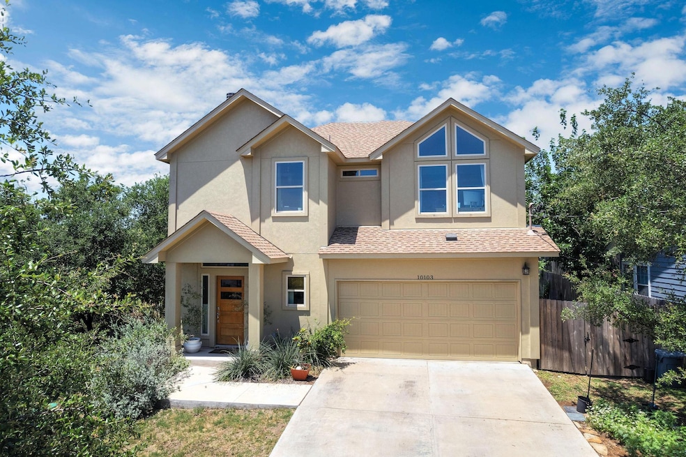 View of front facade featuring stucco siding, an 