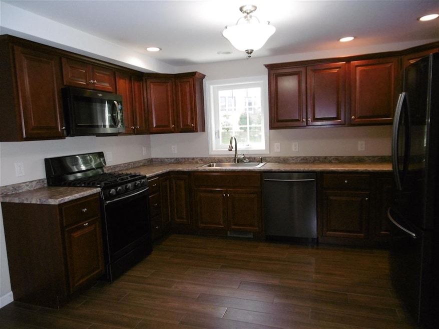 22 Lenox Rd unit 2, Derry, NH 03038 - photo 1