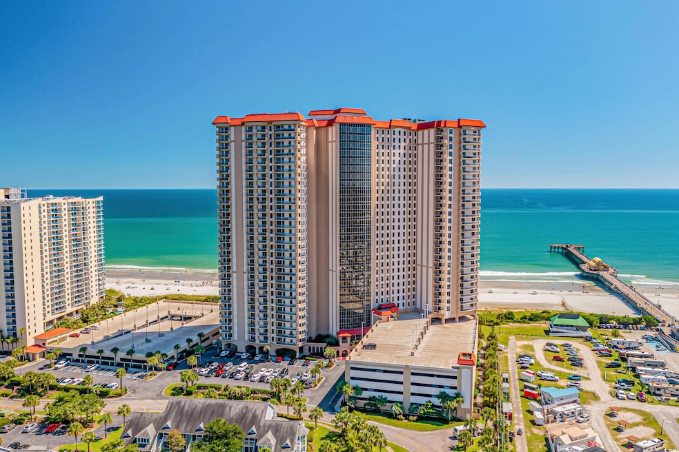 Bird's eye view of waterfront with a beach