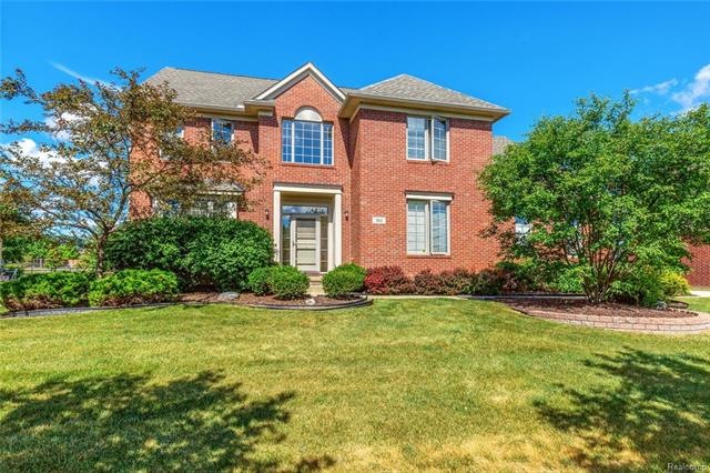 All brick front with casement windows.
