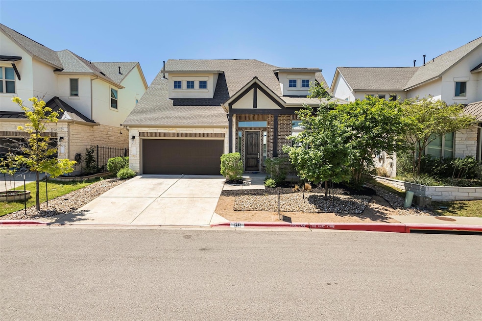 View of front of house featuring concrete drivewa