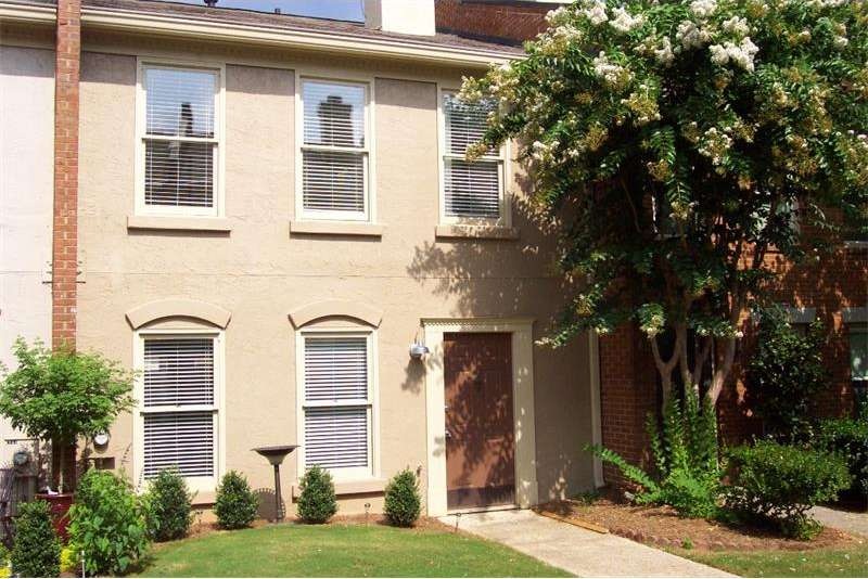FRONT OF THE TOWN HOME WITH PROFESSIONAL LANDSCAPI