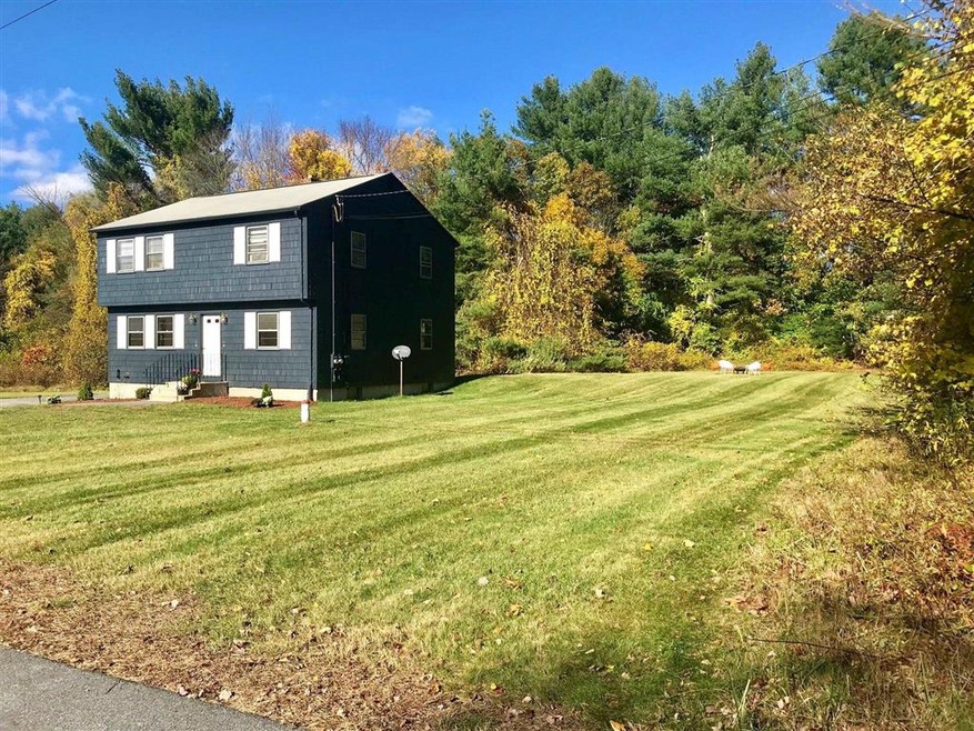 6&8 Victoria Cir unit 6-8, Pelham, NH 03076 - photo 1