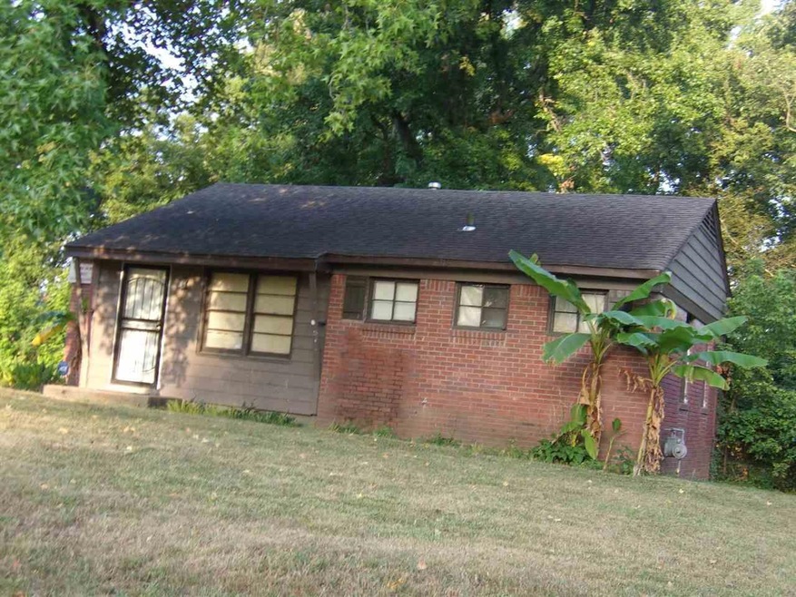 View of front of home with brick siding and a fron
