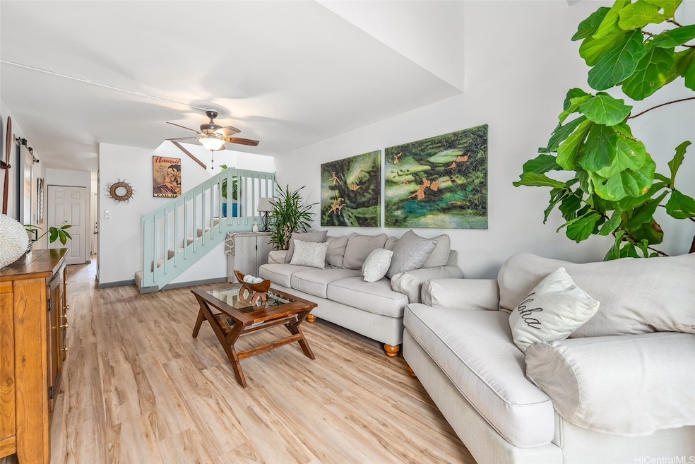 Welcome home to a bright and beautifully maintained living space with a touch of island warmth.