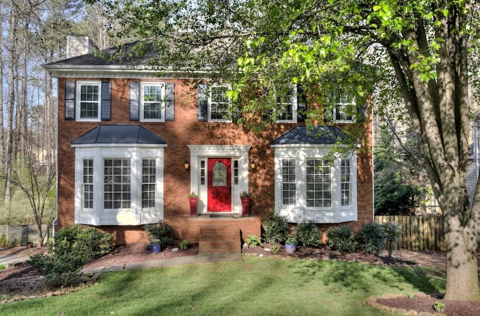 Charming brick fornt home with double bay windows 