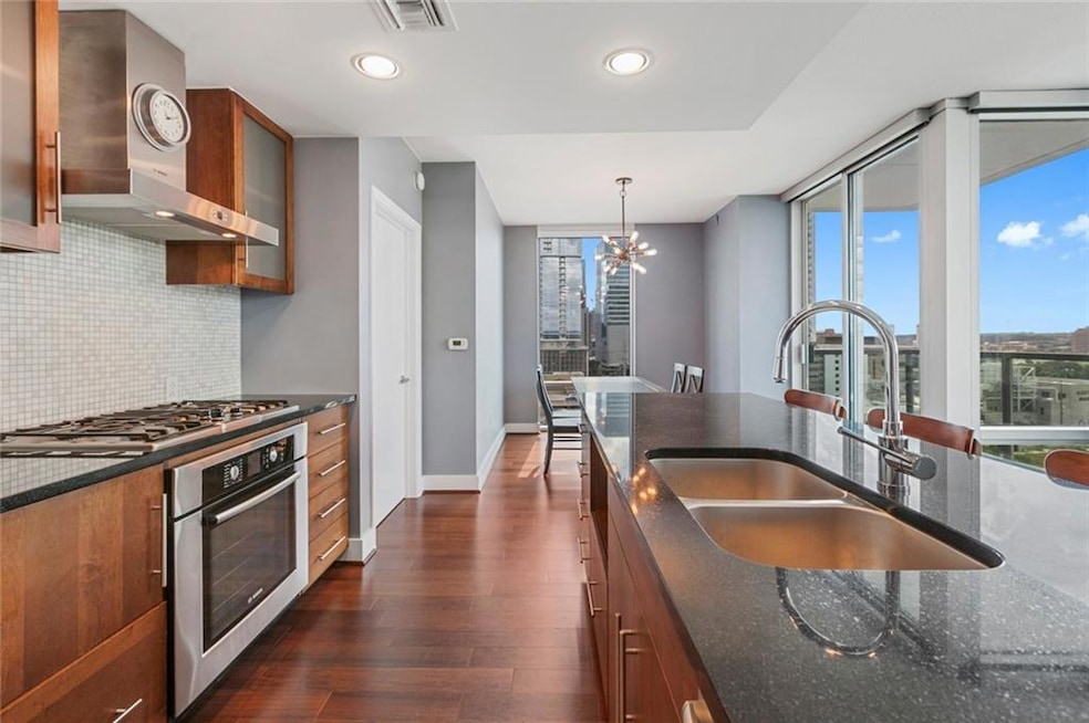 Kitchen featuring appliances with stainless steel