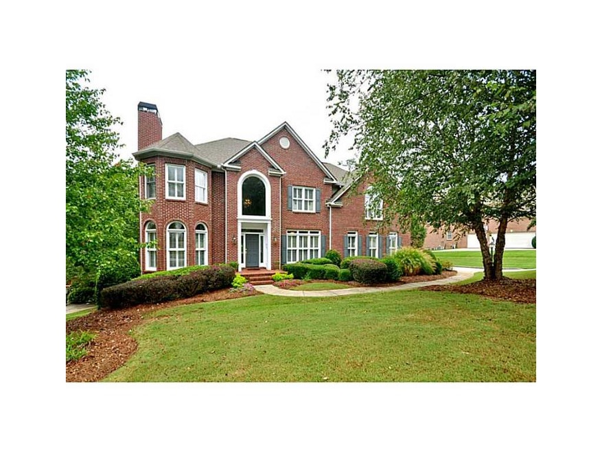 Exterior Front. Handsome three sided brick with ha