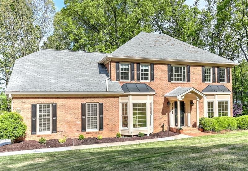 Beautiful traditional home with covered entry in H