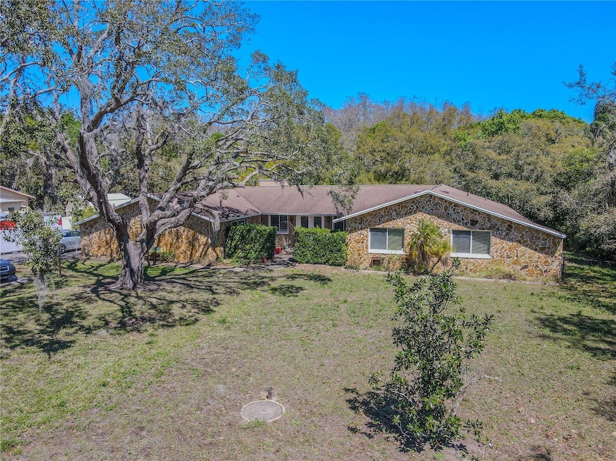 4 bedroom, 3-full Bath, Pool, Detached Garage with Workbench, on 1.27 Acres.