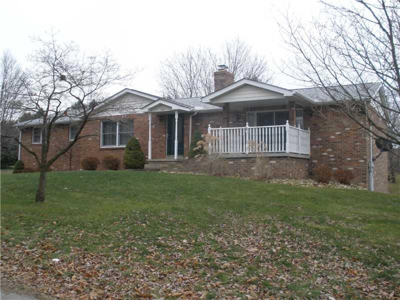Exterior Front. Wonderful brick and vinyl ranch wi