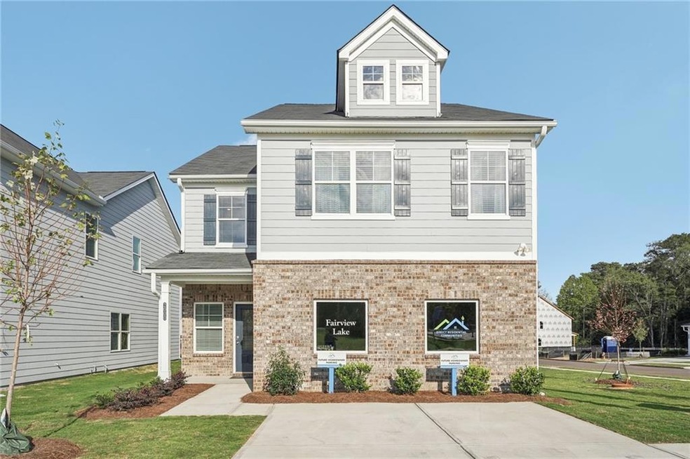 View of front of property featuring a front yard