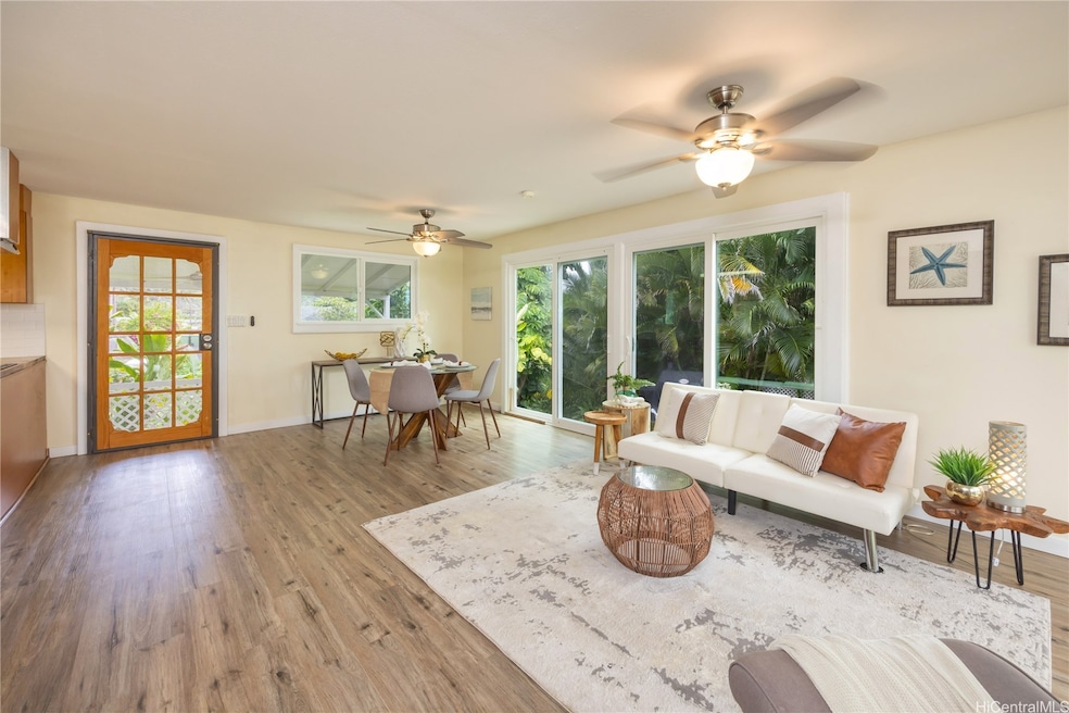 Expansive glass doors invites tons of natural light into the home.