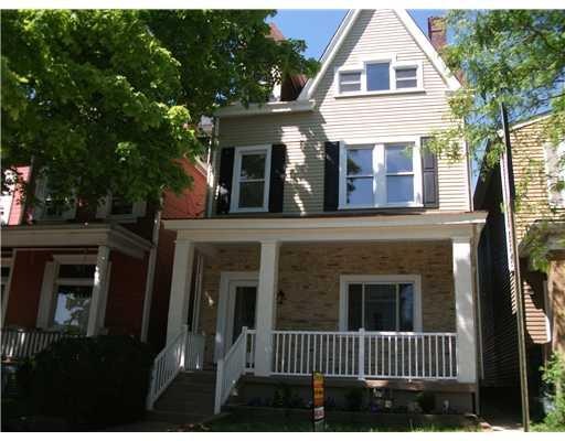 Exterior Front. Updated porch, fresh paint, new ra