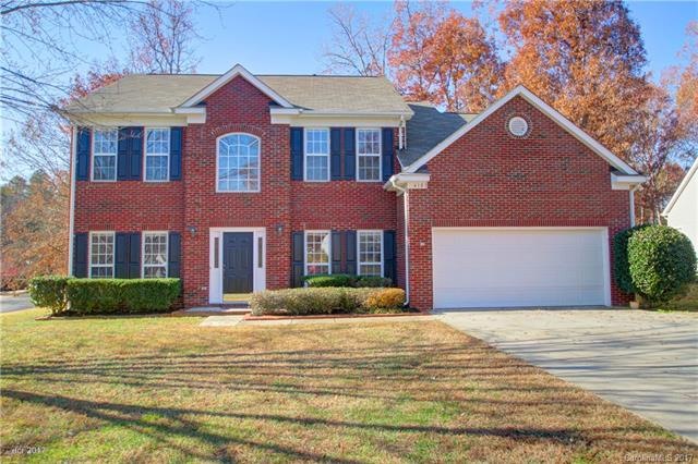 FRONT: Attractive two story home with brick front,