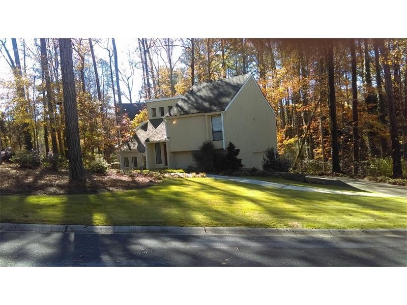 Spacious corner lot with great landscaping!  Can y