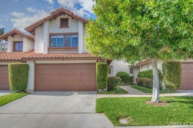 Wonderful townhome with full driveway and attached