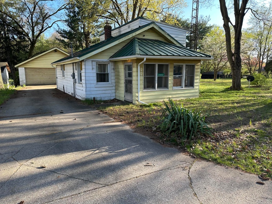 Front view with driveway