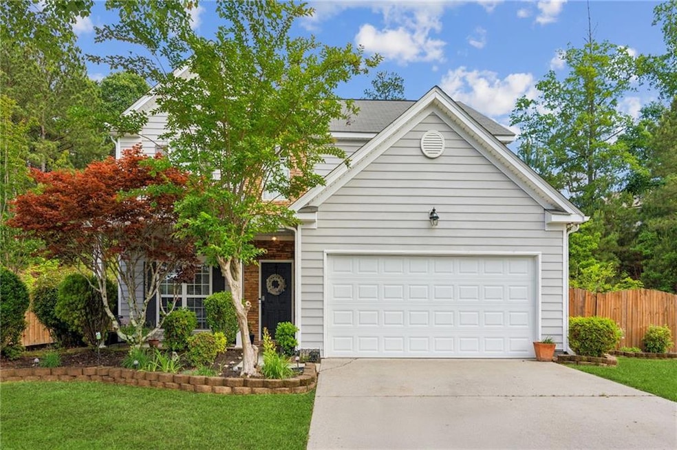 View of front of property featuring driveway
