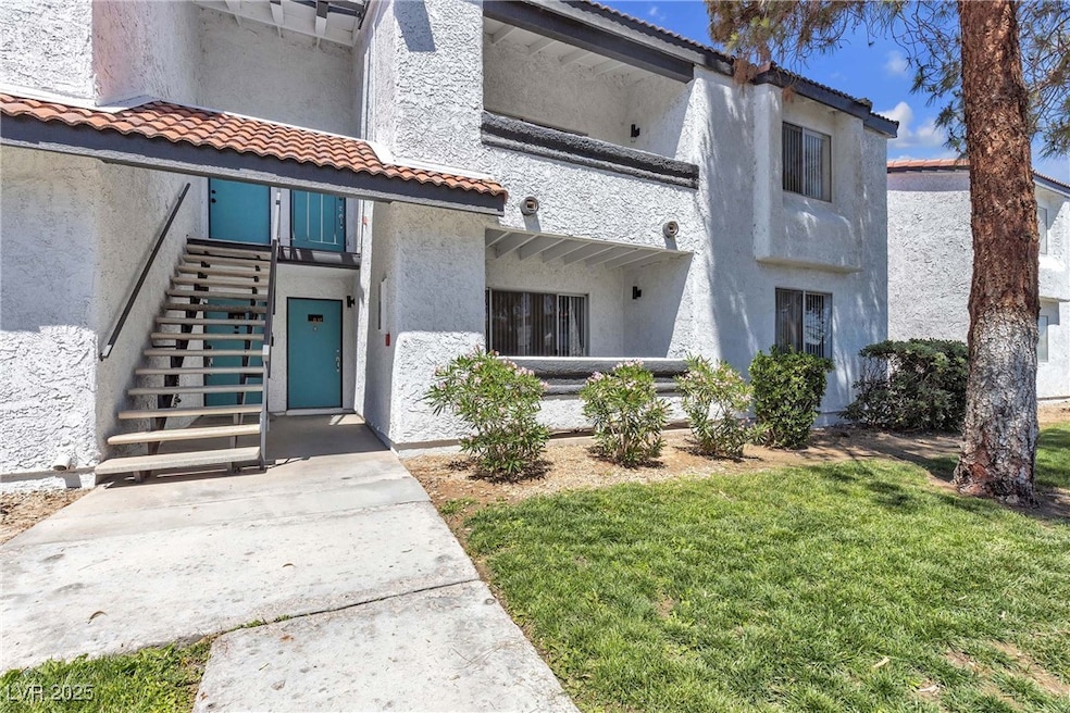 View of property with stairway