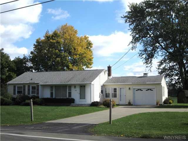 Exterior Front. Maint.free vinyl sided ranch w/arc