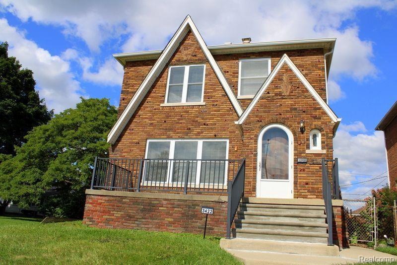 CHARACTER & CHARM-4 BR 3 BATH BRICK HOME!