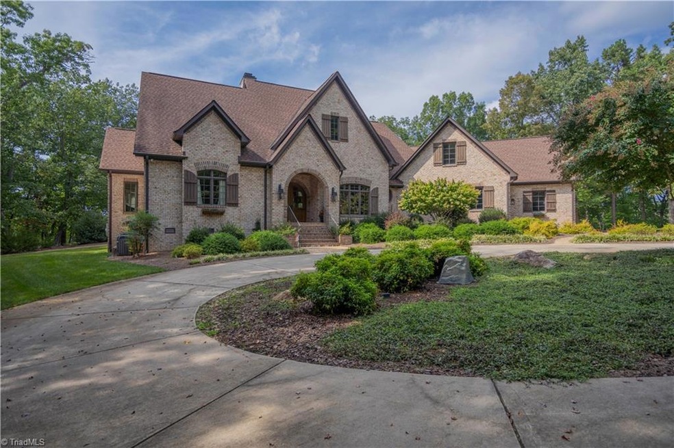 Beautiful entrance to home with circle drive